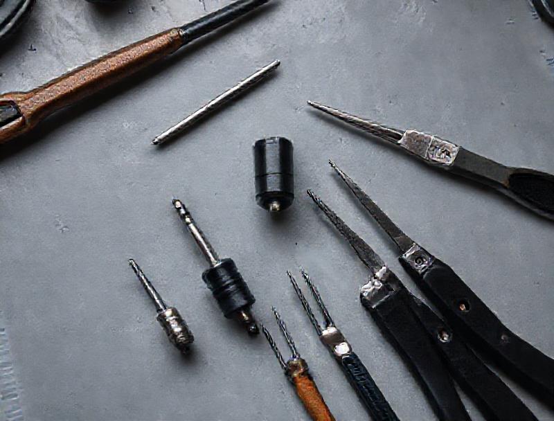 Plug follower and rekeying tools on a work mat